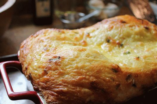 Fotografija Hashbrown pod sirom fondue