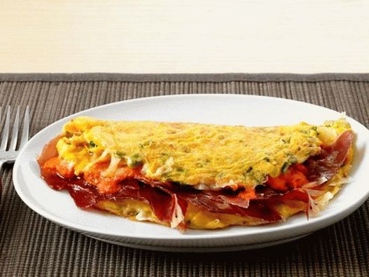 Fotografija španskog omleta sa romesco sosom