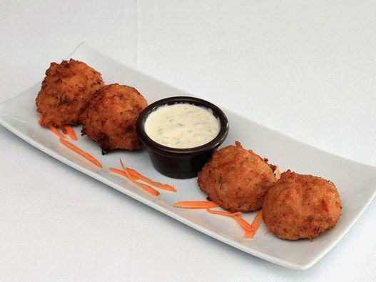 Foto puževi s karipskim morem s umakom Tartar Dip