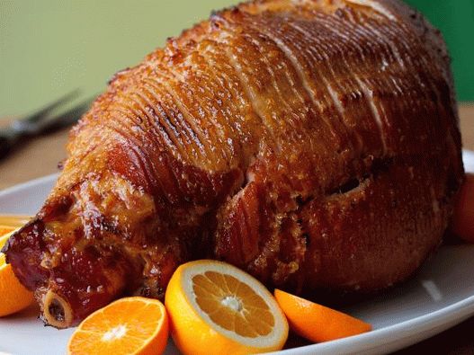 Foto dimljena svinjska šunka u narančastoj glazuri