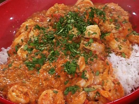 Fotografija kozice u indijskom stilu u kokosovom soku od paradajza