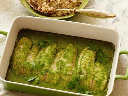 Foto Tilapia u kokosovom sosu sa začinskim biljem u rerni