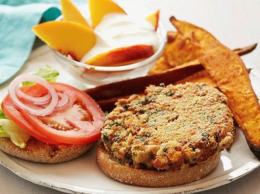 Foto vegetarijanski hamburger sa kotleti od pasulja i kelja